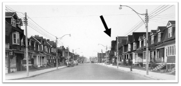 1951 Archival Photograph, facing north on Dufferin Street with the Dufferin Street Presbyterian Church marked by an arrow